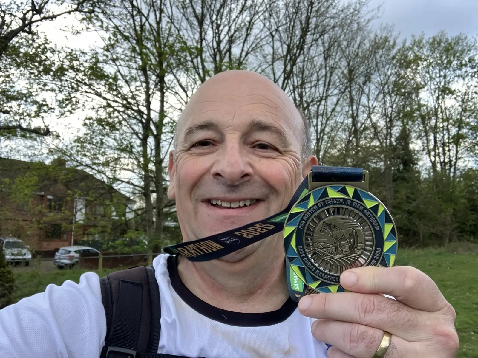 Member of the Month for April 2025. Andrew Burgess holding his medal after completing the Kent Spring Marathon for 2025. Proudly representing Maidstone Harriers