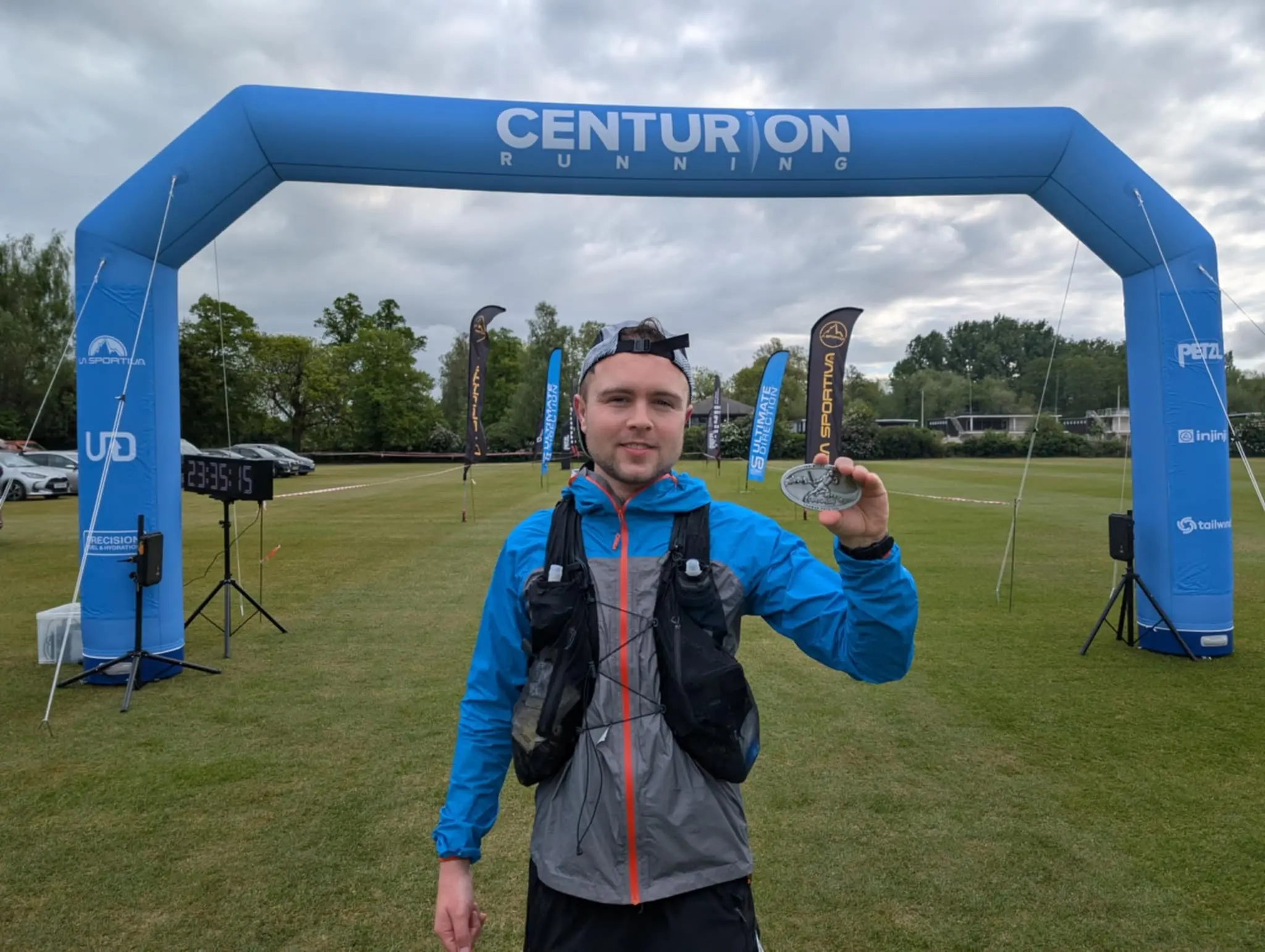Craig Barden smiling after completing the Thames Path 100-mile ultramarathon, proudly representing Maidstone Harriers