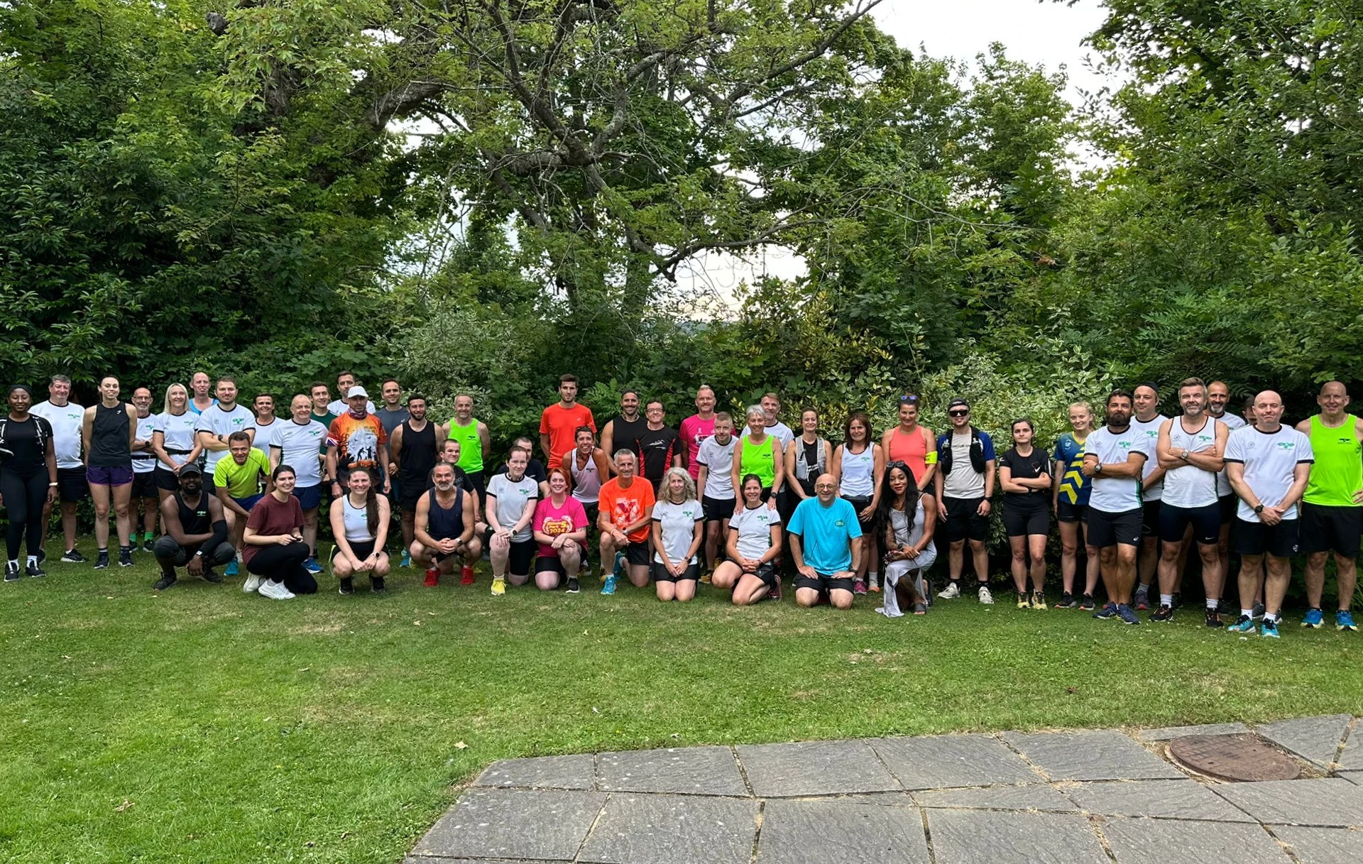 Maidstone Harriers Club Run group photo taken at the Maidstone Hockey Club in July 2025