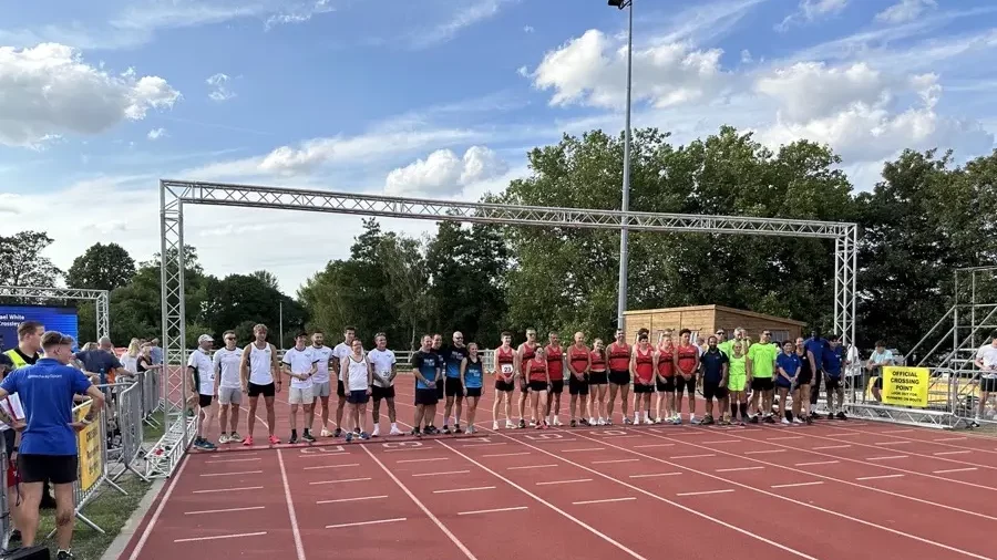 Maidstone Harriers Team A and Team B line up for the start of the relay at the Medway Mile elite races 2025.