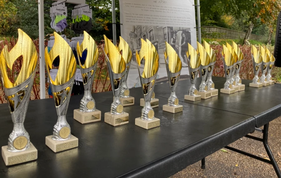 Medals for the Maidstone Half Marathon 2025 at Mote Park. Hosted by Maidstone Harriers, the community driven running club