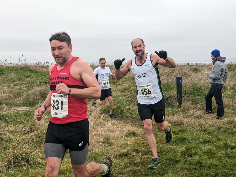 Maidstone Harriers runner giving thumbs during KFL All Hallows.