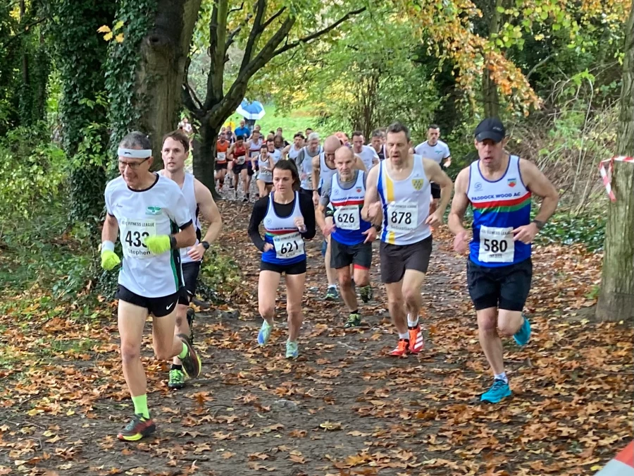 KFL Swanley Park 2023 - Kent Fitness League runners in action through the trees. Maidstone Harriers