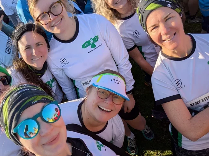 KFL All Hallows 2025 - Kent Fitness League Kate and other female runners posing for photo of the Maidstone Harriers women
