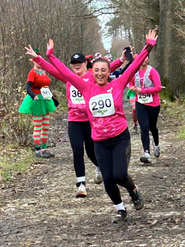 Group of runners in fancy dress taking part in the Turkey Run, 2024, organised by the Maidstone Harriers