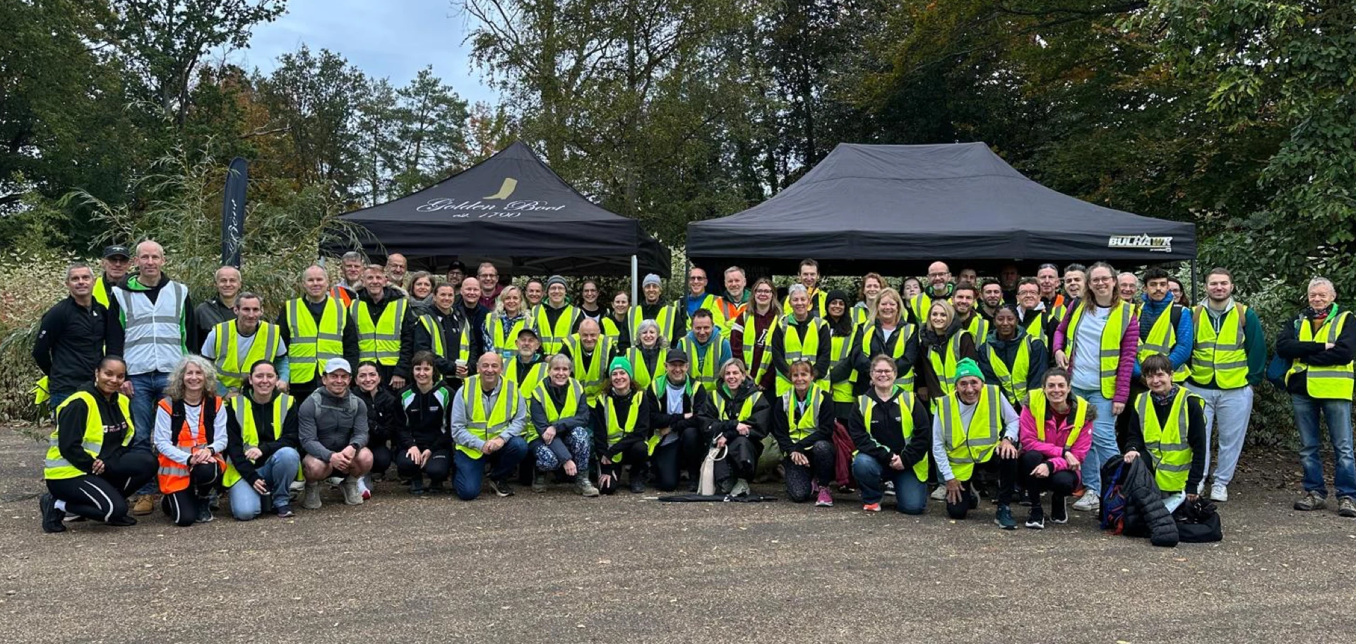 Volunteers lined up for the Maidstone Half Marathon 2025 at Mote Park. Hosted by Maidstone Harriers, the community driven running club