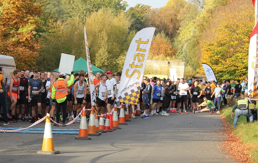 Warming up to start the Maidstone Half Marathon 2025 at Mote Park. Maidstone Harriers, the community driven running club