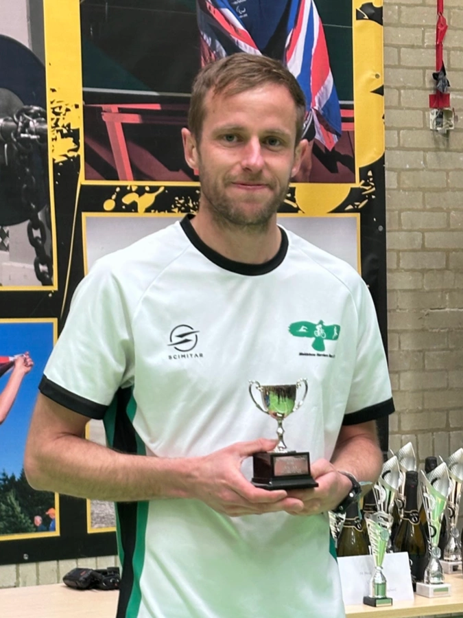 Maidstone Harriers runner Phil Edmonds holding his 2nd place trophy after finishing second overall in the 2025 Kent Road Running Grand Prix