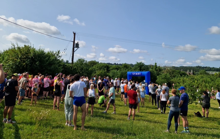 Runners gathering near the start at the 2025 Maidstone Harriers David Thornby 10k in the Kent countryside