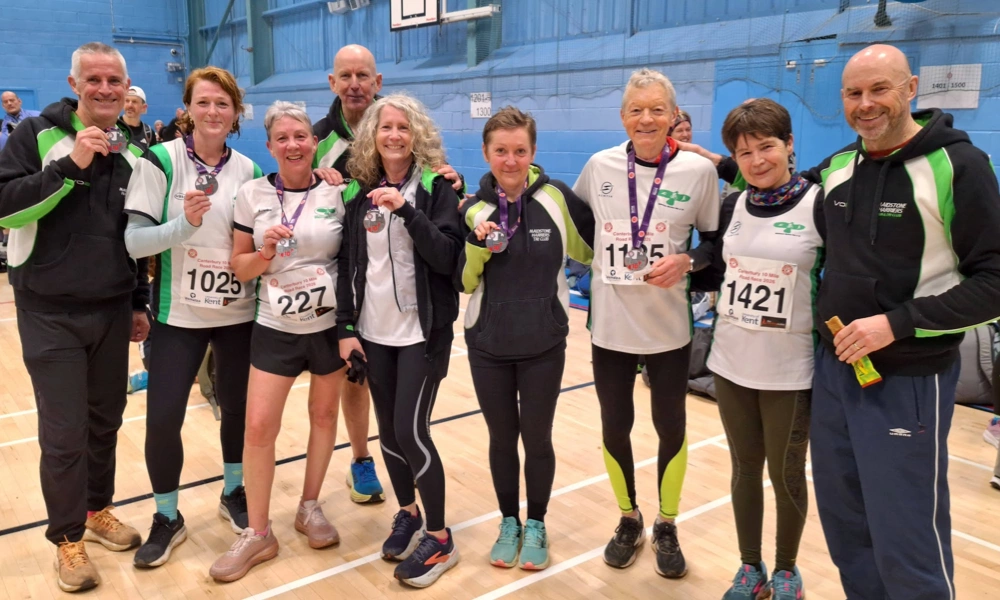 Maidstone Harriers team photo at Canterbury 10 Mile during the 2025 Kent Road Running Grand Prix awards presentation
