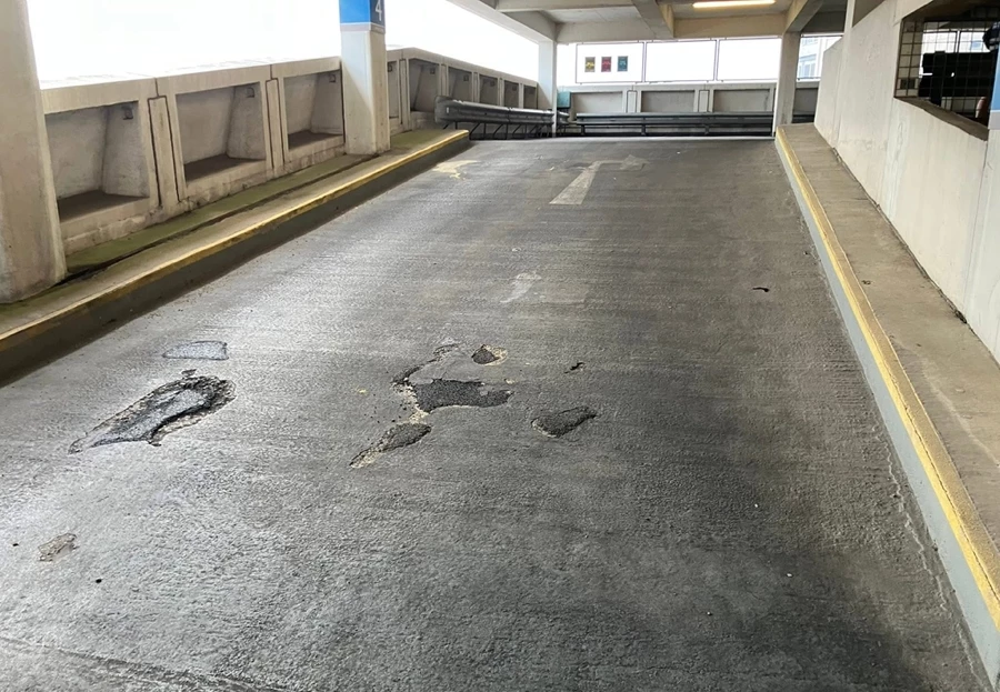 Ramp section of the Southend multi-storey car park marathon course showing worn road surface
