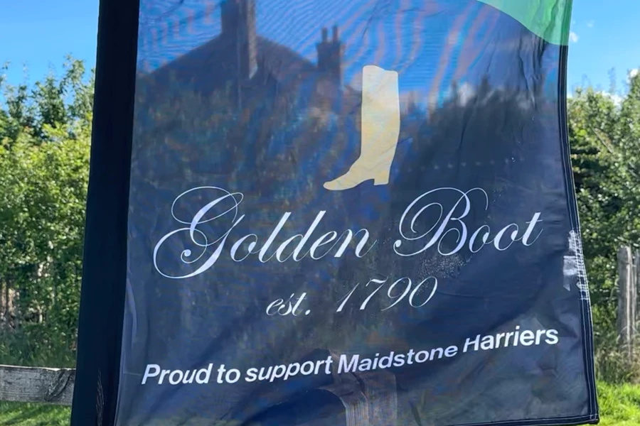 Golden Boot sponsor flag at the 2026 Maidstone Harriers David Thornby 10k.