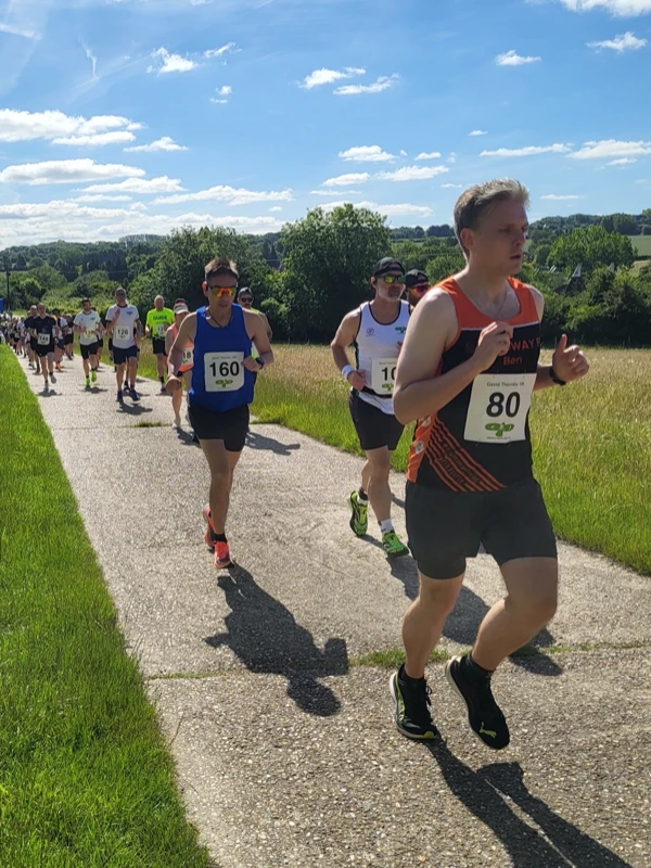 Runners set off on the country path section at the start of the 2026 Maidstone Harriers David Thornby 10k.