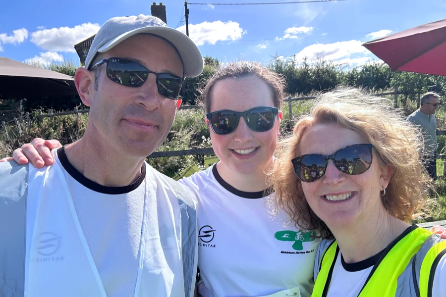 Maidstone Harriers volunteers Rob, Keely and Hannah, smiling at the 2026 David Thornby 10k.