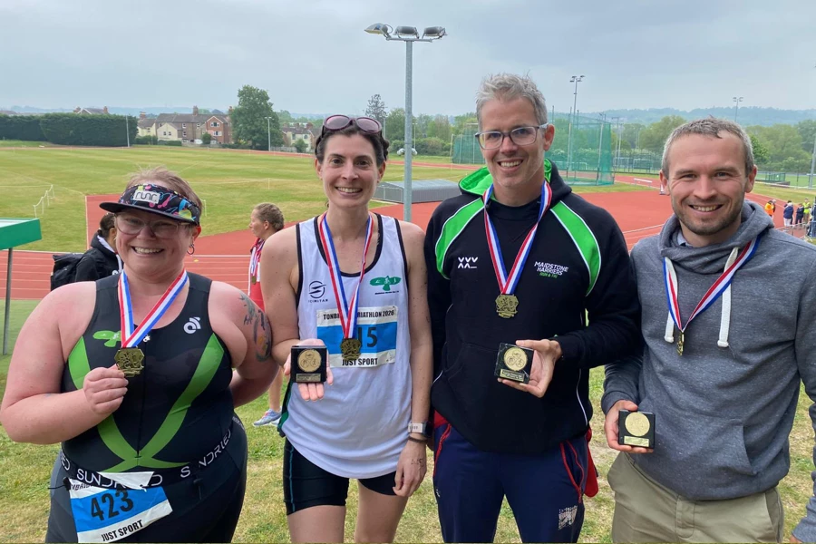 Catey Bowles with Maidstone Harriers teammates after Tonbridge Sprint Triathlon 2026