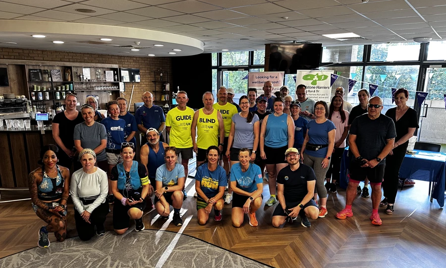 Maidstone Harriers' and other supporter in group photo at Lockmeadow health club, before running for Lift the Curfew and Mid Kent Mind