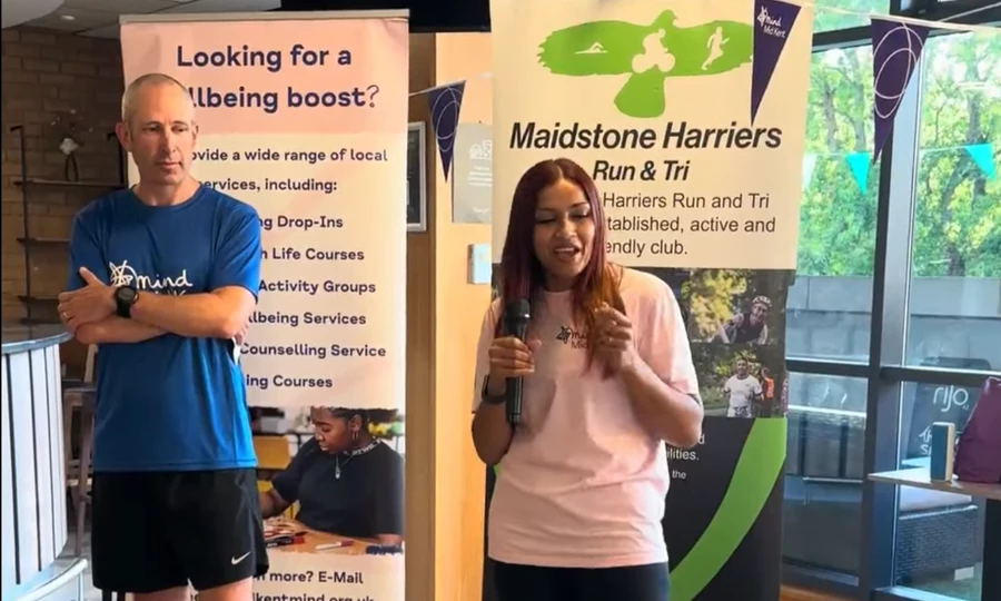 Henu Cummins, CEO of Mid Kent Mind, talking at Lift the Curfew, supported by Rob Dunnill of Maidstone Harriers