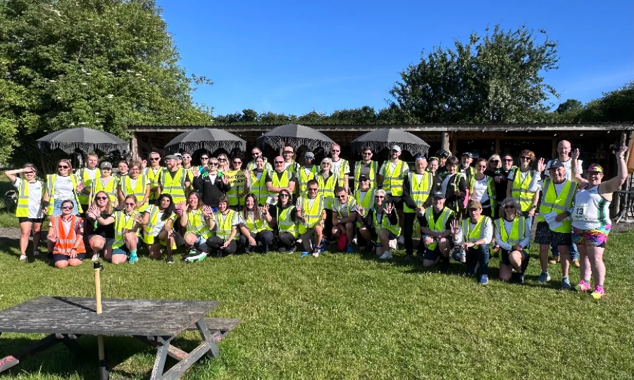 Catey Bowles with Maidstone Harriers teammates volunteering at the David Thornby 10k, 2026